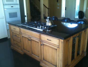 J C M Construction Project Installation of all new wood flooring and tile throughout house. Installation of fireplace tile, new kitchen counter tops, 