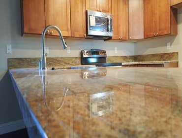 Kitchen Remodel (Water Damage Insurance Claim) This home was damaged during a plumbing failure. The removal of all drywall on the ground floor of resid