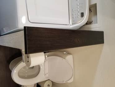 V. Jones Bathroom/Laundry Room Remodel - Tub to Step-in Shower Conversion with Linear Drain
- New Vanity, Toilet, Sink, mirror, toiletries
- All new fl