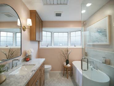 Marble & Pink - Guest Bathroom Remodel This bathroom was redesigned to feel calm, timeless, and beautifully detailed — a true retreat within the home. 