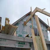 Custom Design Homes Project 1 Custom Design Homes added a screen porch overbuild. There was an open deck prior to this beautiful addition.