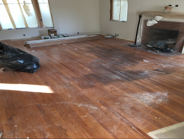 Solid Red Oak Repaired stained and damaged area with new 1/2" x 2" solid Red Oak. Sand and Finished 825sqft of new and old flooring natural color.