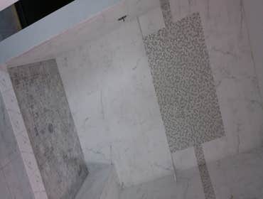 Bathroom Project Demolition, preparation and installation of shower pan, shower seat, shower walls, accent and bathroom floor.