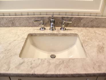 Baine Contracting Inc Project Multiple jobsites - showing kitchens, interior and exterior trim work, new homes, bathrooms, tile work, wood and iron ra