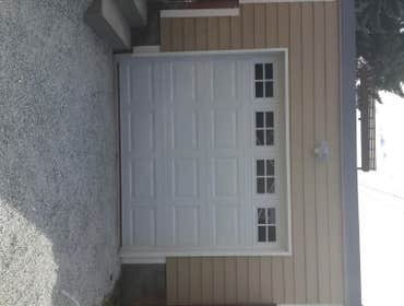 Garage Renovation This garage got a makeover! New door, roofing, siding, sheet rock, and new windows!
