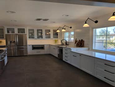 An All-White Spacious Kitchen That Is Energy Efficient Too