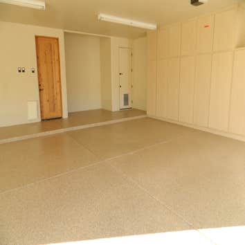 This is a large garage completed in Anderson,SC. This garage was peeling up from a previous install and we successfully used our diamond grinder to rem