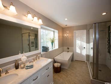 Photos by Edgewater Construction LLC #3 Design/Build - Complete remodel of Master Bathroom with addition of a walk-in closet, demolition of existing be