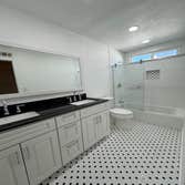 Photos by Apex Designer & Builder #1 Master bathroom and a bathroom remodeled