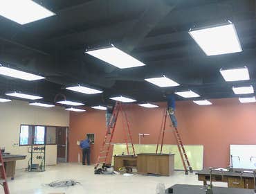 TSTC Building at Breckenridge, Texas Over 100 flourescant light fixtures had to be suspended from a sloping ceiling by using stainless-steel, braided c