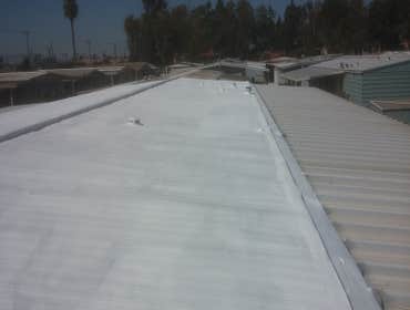 Elastomeric white roof coating
