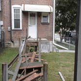 Handicap Ramp Project required the removal of an existing ramp and railing which than was replaced with the construction of a new ramp and railing. Als