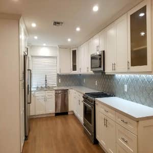 Bathroom and Kitchen Remodel Transitional style White Shaker Kitchen with Ceramic Backsplash and Ceasarstone countertop.
Remodeled both...