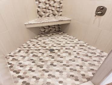 Photos by Empire Homes & Remodeling, Inc #4 Master shower Empire custom home builders