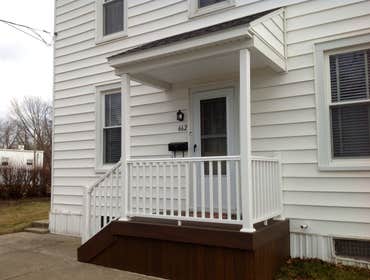 Project photos from Griesemer Construction The exterior of this porch was old deteriorated concrete with a aluminum posts & roof.Now it's trex lumber d