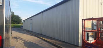 Steel Siding Replace PRB Panel on exterior of commercial building