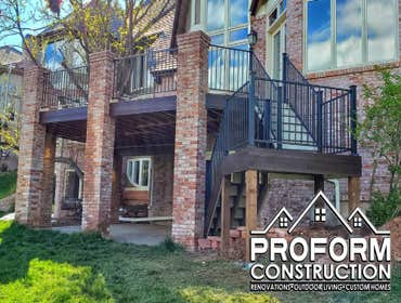 Custom Outdoor Living #1 Custom Hand Stacked Gable Roof with Full Glass Enclosure