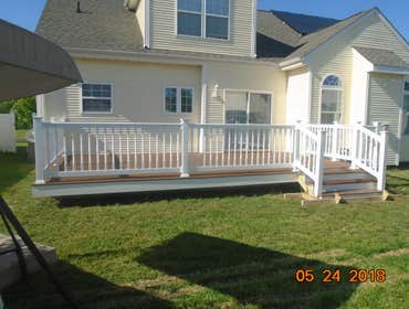 Photos by Saviors Custom Carpentry, Inc #1 Composite steps, vinyl railings & 1x4 azek