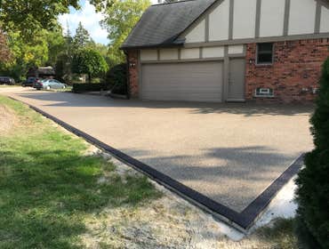 exposed aggregate Driveway Photo by Potoroka Concrete Macomb MI