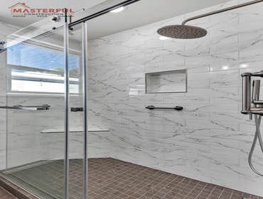 Photos by Masterful Construction Inc #21 Clean, simple bathroom remodel.