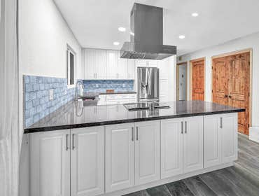 Kitchen Remodel After 14 years our client is now enjoying her new kitchen and is happy with how seamless everything looks. We created a spacious, brigh