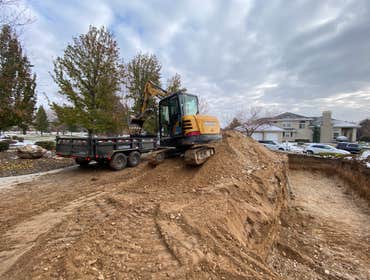 Photos by Asap Inc Replacement Septic System, Trenches being dug out.