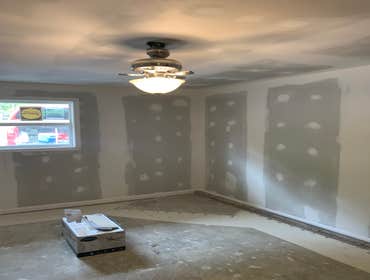 Photos by Flaugh's Construction and Design #3 Drywall hung and finished.