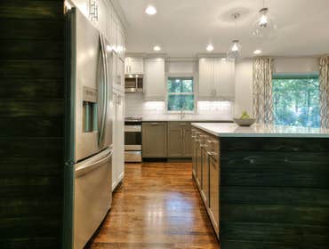 Decatur Mid-century Modern Removed wall between living room and kitchen to create an open floor plan kitchen, custom built cabinetry and island.