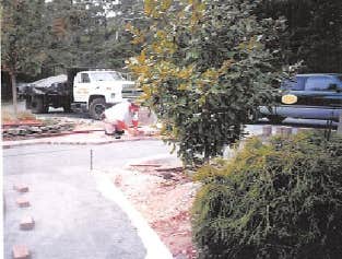 Dad installing pavers