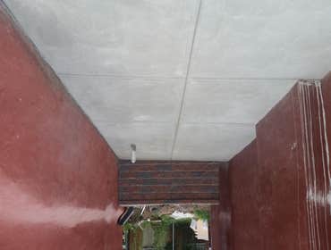 Wall and parking pad