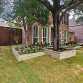 Landscape remodel w/ stone retaining beds