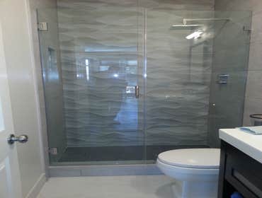 Interior Full demo and rebuild, new cabinets, appliances, counter tops, backsplash, window and flooring.