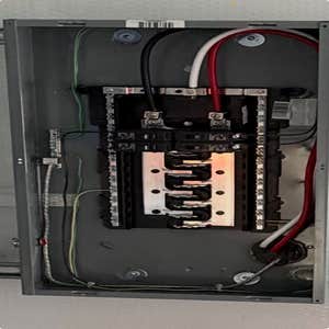 Photos by Dobbins Electric Co #4 Wire metal building garage. Installed new meter and panel.
