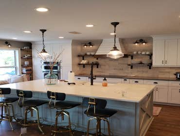 Photos by Jmc Builders Group LLC #1 Complete tear out and remodel with white shaker cabinets , custom oak shelving and bench