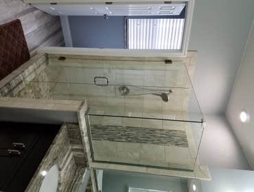 H Master Bathroom New cabinets, soak tub, new tiled shower w/deco insert, granite, frameless glass, floor tile, lighting, plumbing, ect.