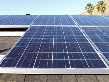 Installations Green Stock Solar ground-mounts and installations on comp, tile, and metal roofs!
