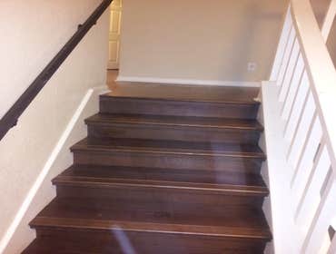 Sushmi's Wood Flooring and Stairs Sushmi did not like carpeting. We tore out over 1200 Sq. Ft. and replaced it with Maple glue down flooring. We also