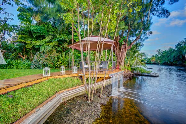 Gazebo with Waterfall over the river