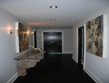 Gold Coast Residence Elegance and Simplicity was the motto for this three bedroom condominium. The design incorporates rich materials with a subdued an