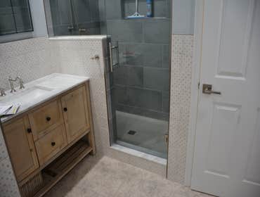 Photos by Ameripro Remodeling, LLC #9 Transform your basement into a beautiful, functional living space with our complete finishing service! Whether yo