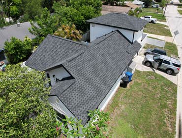 Photos by WOODSTONE ROOFING