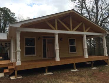 Full House Remodel & Addition Extended house, added front porch and new roofing, added detached garage, added back deck