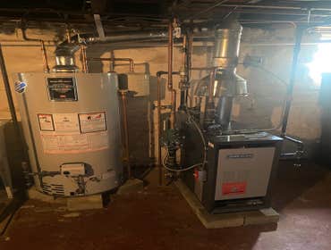 Photos by Stellitano Heating and Air Conditioning, Inc #15 Boiler and water heater installation.
