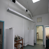 Commericial Remodel Transformation from Industrial Steel building walls with garage door in this room into a fantastic new space!