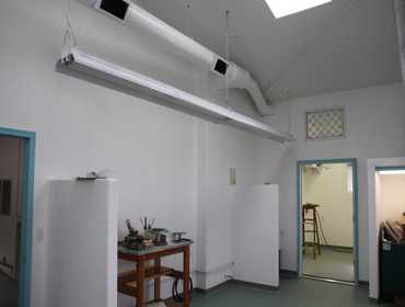 Commericial Remodel Transformation from Industrial Steel building walls with garage door in this room into a fantastic new space!