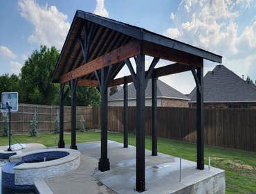 Big Timber Cedar Gable Cedar Gable structure utilizing Big Timber Wood. Two-tone paint job, custom fabricated post plates