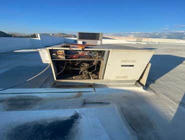 Photos by Airsun Solution Inc #1 2 carrier RTU Replacement