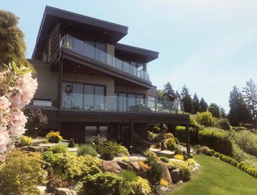 Photos by Design Ark Inc #5 House with a view with solar panel, radiant floor heating and green roof
