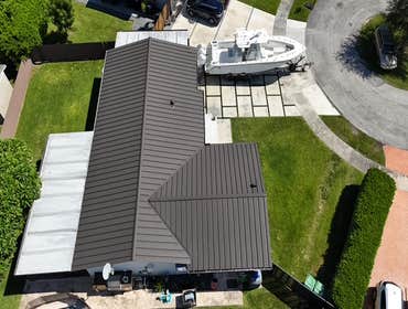 Photos by Gold Star Miami Corp #1 metal roof panels all are . 25 years warrantee
