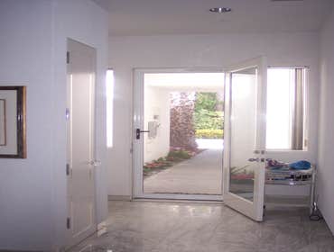 TRU View Security Screen Door Stainless steel epoxy coated mesh. No more unsightly bars. Beautiful view looking out. Affords daytime privacy.